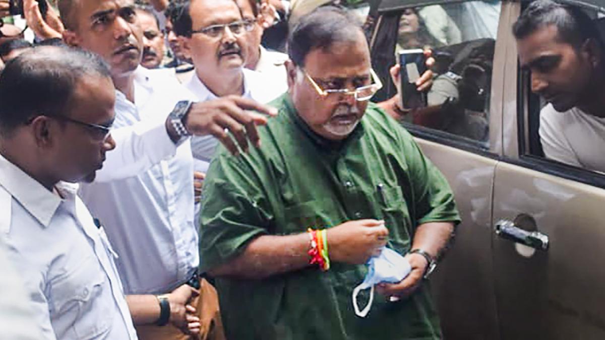 West Bengal minister Partha Chatterjee being produced at a court after he was arrested by ED. (PTI photo)