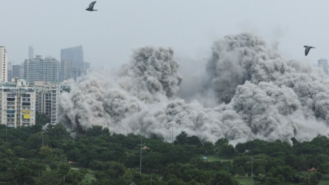 Walls, windows of nearby buildings damaged during Twin Towers demolition - Vimarsana News