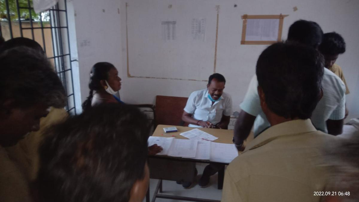 The DMK councillor’s husband checking the attendance register and questioning workers in a government health office in Coimbatore.