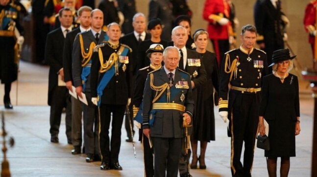 King Charles and sons escort Queen Elizabeth's coffin as people line up to pay respects