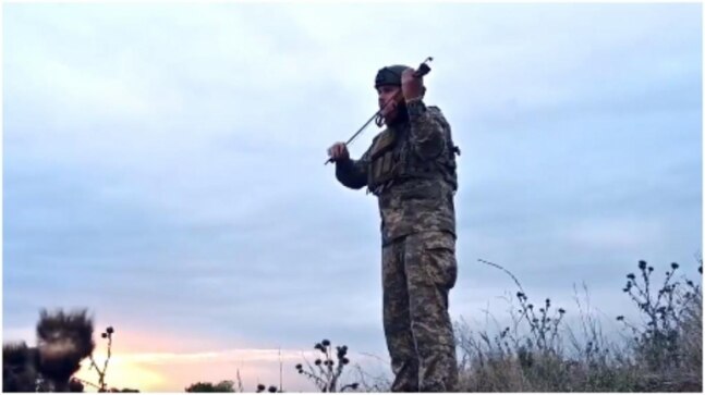 Ukrainian street musician serving in the army plays the violin on the frontline. Hauntingly beautiful, says Internet