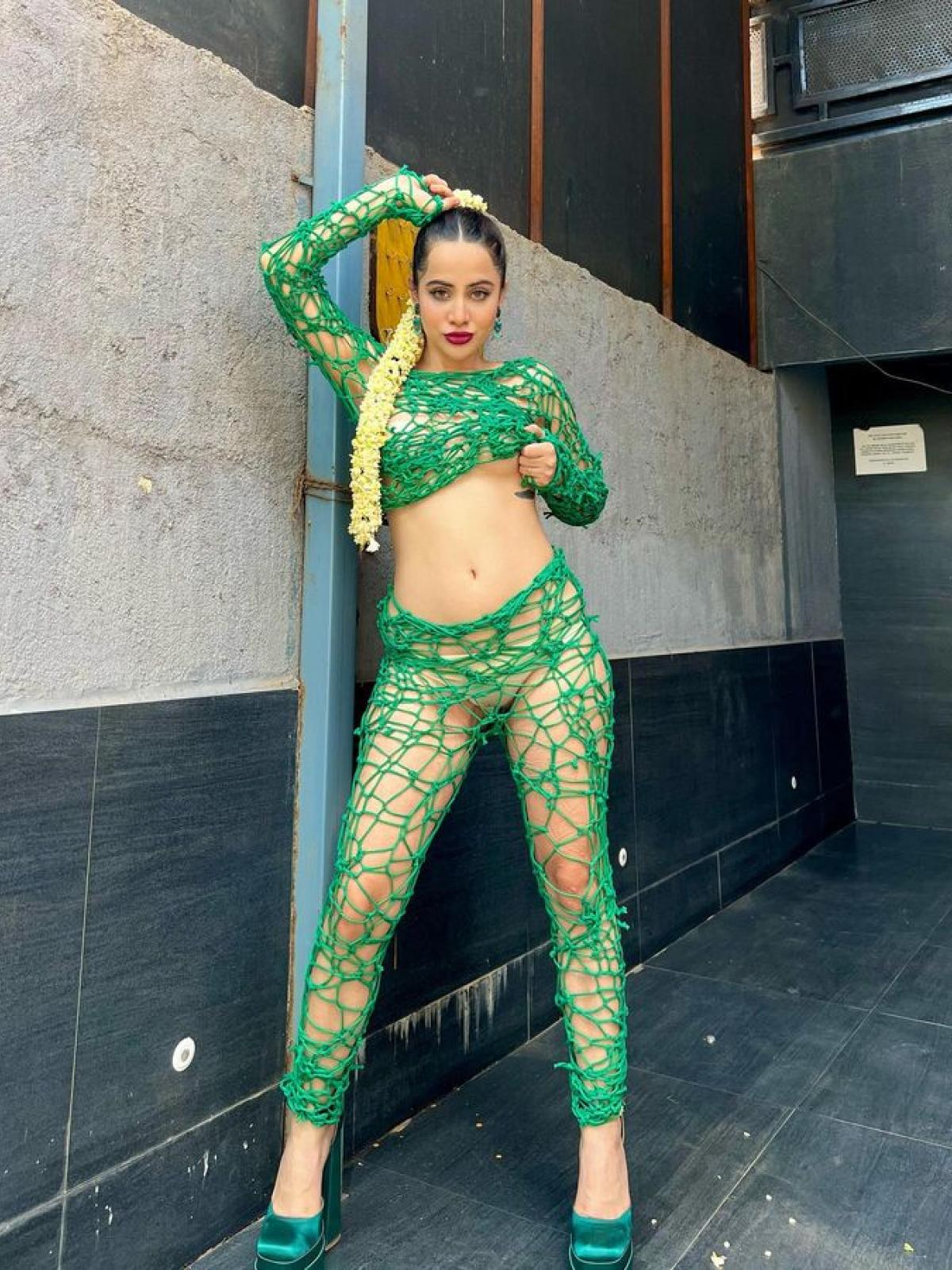 urfi javed green dress Urfi Javeds Daring Green Hanger Dress: A Bold Fashion Statement No One Saw Coming!, Urfi Javed has done it again! Her latest outfit, a green dress crafted from hangers, defies norms and sparks