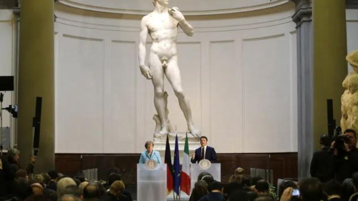 German Chancellor Angela Merkel, left, and Italian Prime Minister Matteo Renzi speak during a press conference in front of Michelangelo's "David statue" after their bilateral summit in Florence, Italy.