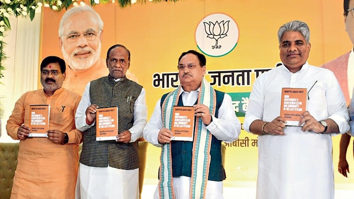 (From right) OBC leader Bhupendra Yadav, BJP president JP Nadda and OBC Morcha chief K.  Laxman at the party's OBC MPs meeting in Delhi, March 30. (Photo: ANI)