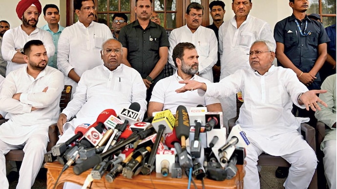 Nitish Kumar addressing media persons in New Delhi on April 12 as Tejashwi Yadav, Mallikarjun Kharge and Rahul Gandhi look on.  (Photo: ANI)