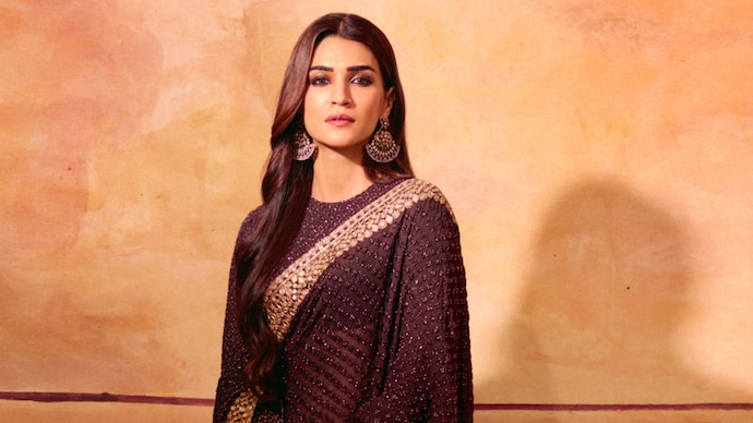 Kriti Sanon styles chocolate brown saree with comfy and sparkling juttis.  They cost Rs… - India Today