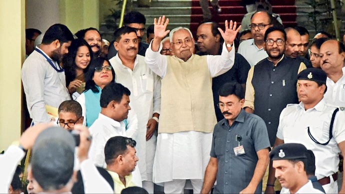 THE NITISH WAVE: The Bihar CM leaving after the conclusion of the winter session of the assembly in Patna, Nov. 10 (Photo: ANI)