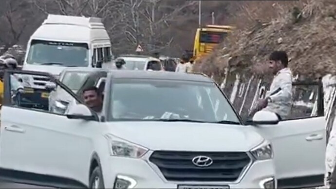 Watch: Man drives car with doors open in Manali. Kullu Police takes action - India Today