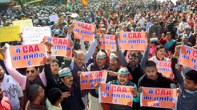 People  participate in a rally in support of Citizenship Amended Act (CAA) and National Register of Citizens (NRC) in Bhopal, January, 2020. (Image: PTI)