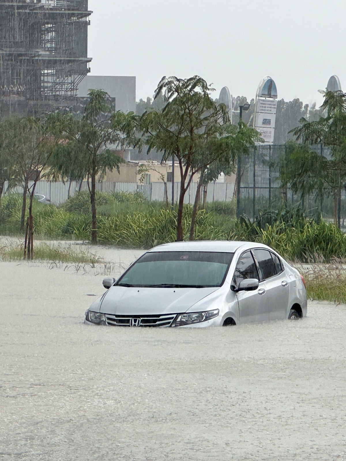 Dubai flooded after heavy rain: Visuals of cars stalled on roads, buses  abandoned - India Today