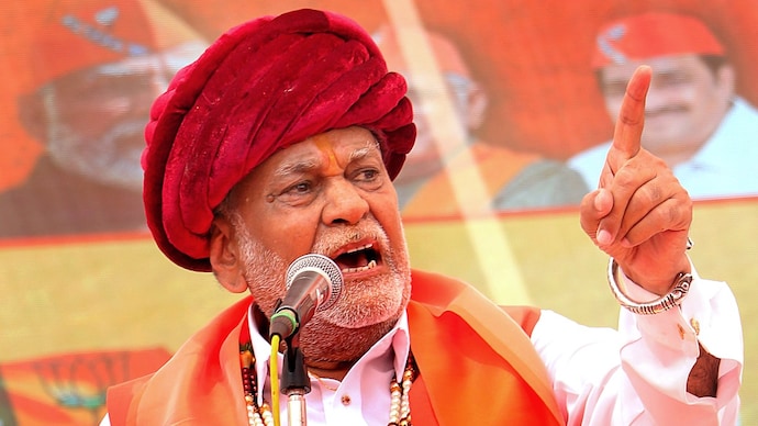 Union Minister of State and BJP candidate Parshottam Rupala addresses a gathering in Rajkot. (PTI Photo)