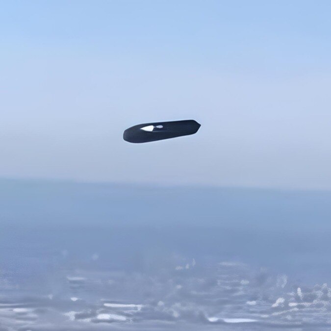 Is that a UFO? Mysterious 'flying cylinder' caught on camera over