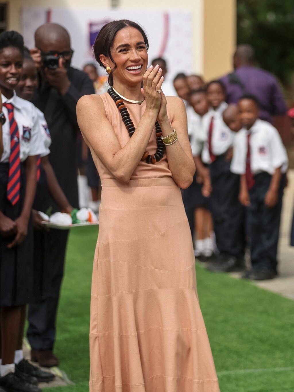blue dress for baby girl Meghan Markle Tour Of Nigeria 2024 Coral Dress main image 0