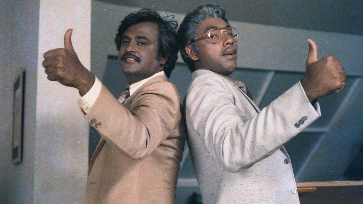 A photo of Rajinikanth and Sathyaraj.