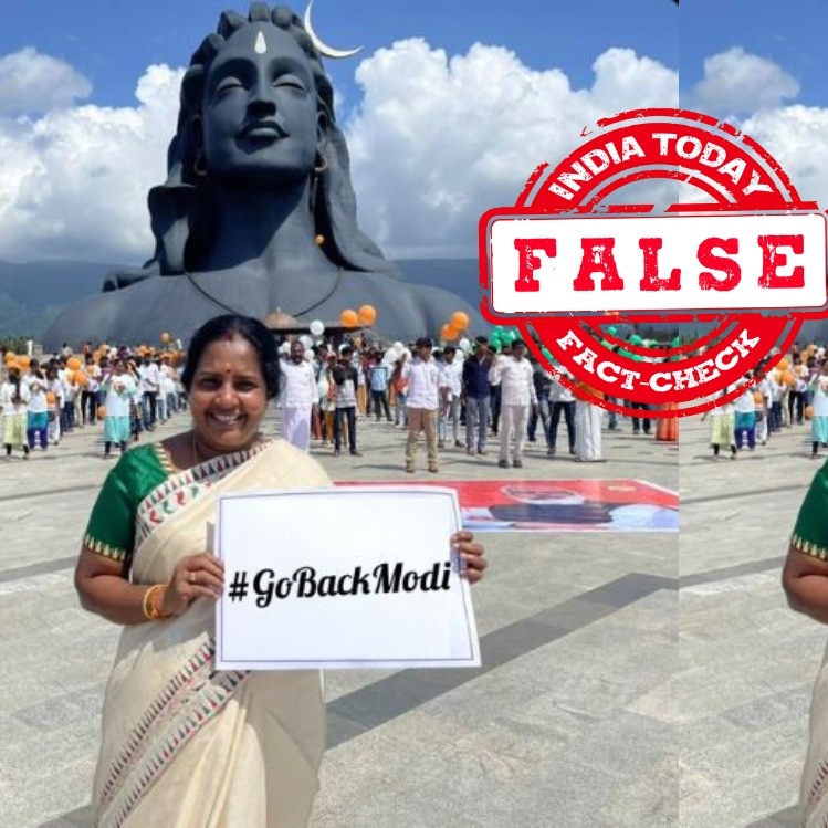Fact Check: Old photo of BJP MLA holding placard edited to read 'Go Back Modi'