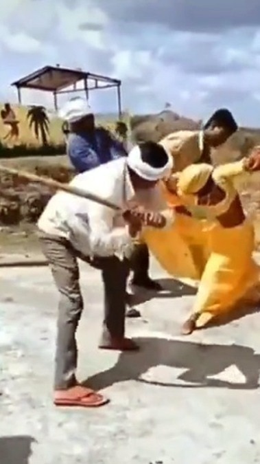 Woman beaten with stick in Madhya Pradesh