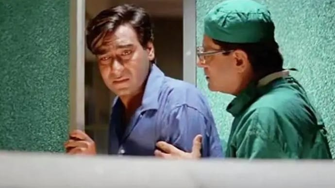 Ajay Devgn in a scene from Mahesh Bhatt's film Zakhm. Ajay Devgn Zakhm, Ajay Devgn Zakhm