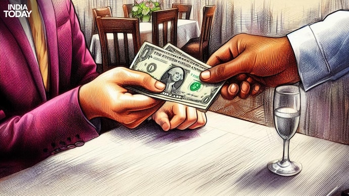 સેવા ઉદ્યોગમાં ટિપિંગ એ સામાન્ય પ્રથા છે. (વાણી ગુપ્તા/ઇન્ડિયા ટુડે દ્વારા ચિત્ર) ટીપીંગનું ઉદાહરણ