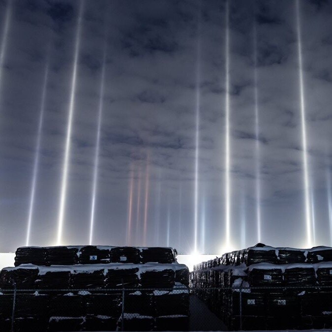 Mysterious pillars of light falling from the sky captured on