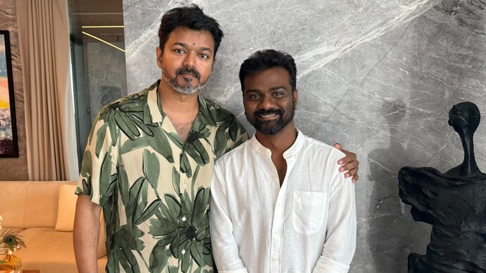 A recent picture of Amaran director Rajkumar Periasamy with Thalapathy Vijay (Credit: X/Rajkumar Periasamy)