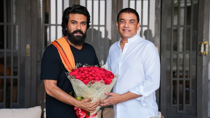 Ram Charan is likely to take a pay cut after the medium run of Game Changer and do a film for producer Dil Raju. A picture of Ram Charan and Dil Raju.