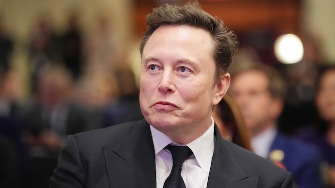 Elon Musk’s net worth falls below $400 billion as Tesla stock plummets