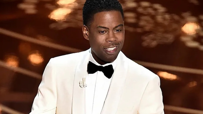Chris Rock Oscar reacts to returning as host (Photo: AP) Chris Rock