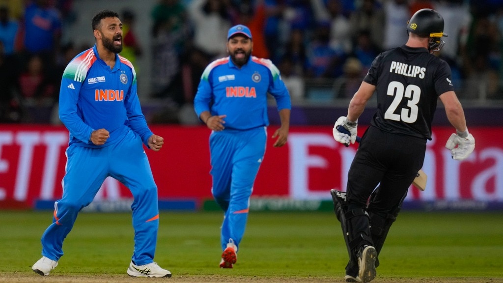 Varun Chakravarthy, Rohit Sharma (AP Photo/Altaf Qadri )