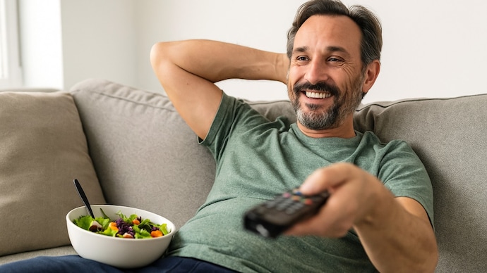The real big binge-watching trap is the mindless snacking that accompanies it. Representative image (Generative AI)