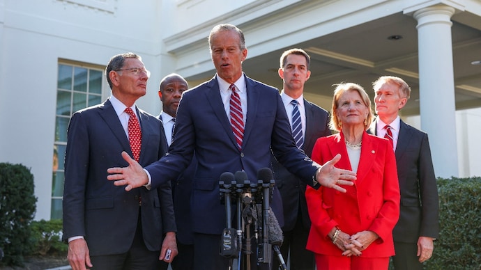 Reuters) John Thune (R-SD) speaks about shutdown, with fellow senate Republicans next to him.
