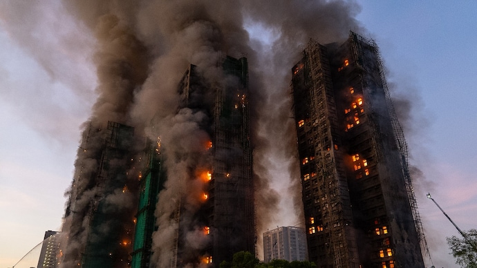 AP) Smoke rises after a fire broke out at Wang Fuk Court, a residential estate in the Tai Po district of Hong Kong
