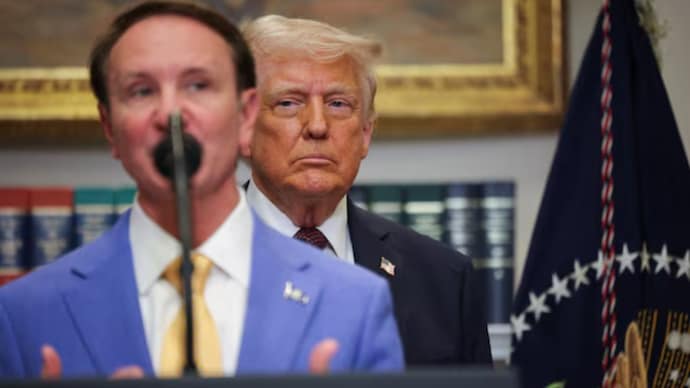 Reuters) Jeff Landry and Donald Trump