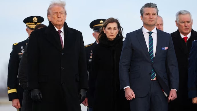 Reuters) Trump, accompanied Hegseth, traveled to Dover Air Force Base in Delaware