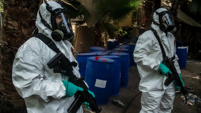 Getty) Mexican police raiding a Sinaloa cartel drug lab which was making US bound synthetic drugs like meth and fentanyl.