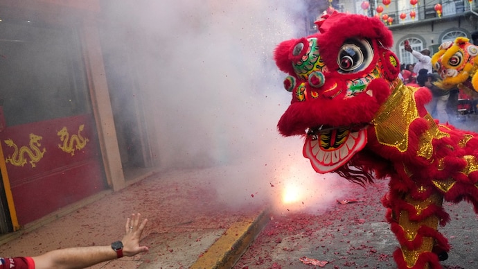 Chinese communities around the world welcomed the Year of the Horse with traditional prayers and fireworks. (AP photo) Chinese New Year