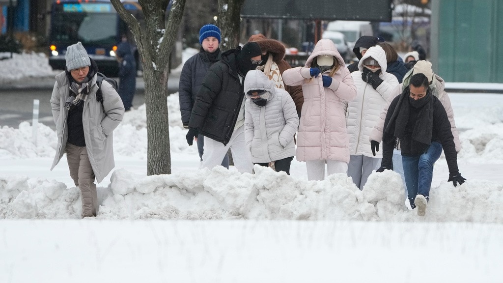 Millions of Americans brace for blizzard conditions as storm threatens East Coast