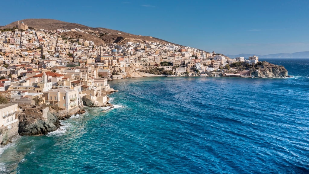 You can live on this Greek island for free. There's just one catch