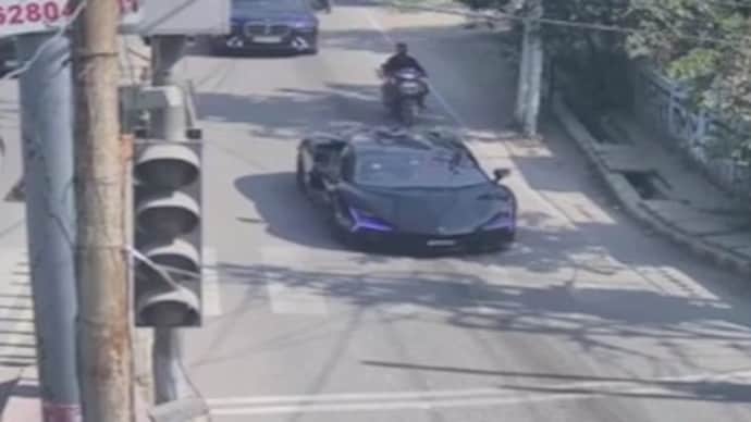 CCTV shows bodyguards of tycoon's son rushing to his aid after Lamborghini crash Kanpur Lamborghini crash