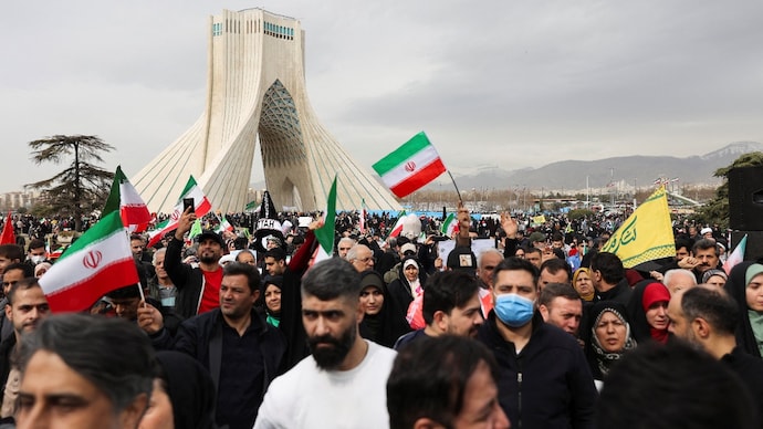 People gather near Azadi Tower during the 47th anniversary of the Islamic Revolution in Tehran. People gather near Azadi Tower during the 47th anniversary of the Islamic Revolution in Tehran.