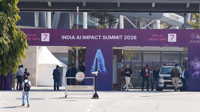 Security officials at the entrance of Bharat Mandapam, ahead of the AI Impact Summit 2026, in New Delhi, Sunday, Feb. 15, 2026. (PTI) Security officials at the entrance of Bharat Mandapam, ahead of the AI Impact Summit 2026, in New Delhi, Sunday, Feb. 15, 2026. (PTI)