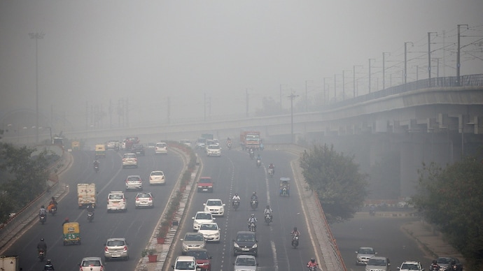 A haze of smog hangs over Delhi’s road. The Delhi government and IIT Madras have signed an MoU to test photocatalytic surfaces that could break down pollutants directly from the city's roads and buildings. (Photo: Reuters) A haze of smog hangs over Delhi’s road. The Delhi government and IIT Madras have signed an MoU to test photocatalytic surfaces that could break down pollutants directly from the city's roads and buildings. (Photo: Reuters)