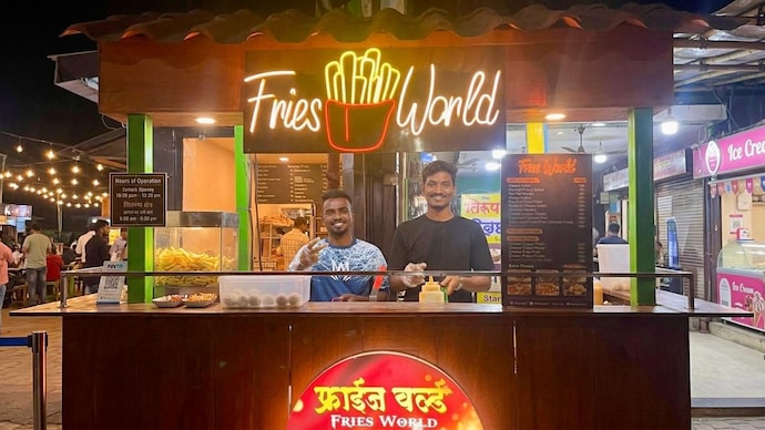 In Photo, Swapnil Shivaji Chaudhari (Right) wroking as Operations role at Accenture and Mandar Shivaji Gorkar (Left) runs Fries World as their Side hustle. Gen Z is redefining work by using traditional jobs as a means to fund side hustles and micro-businesses.