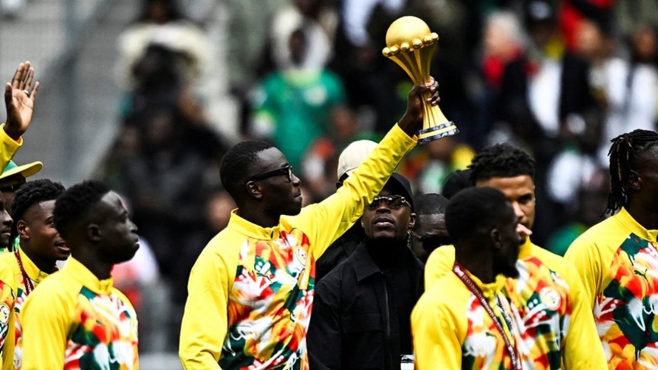 Senegal show off AFCON trophy as players defy controversial call to strip title