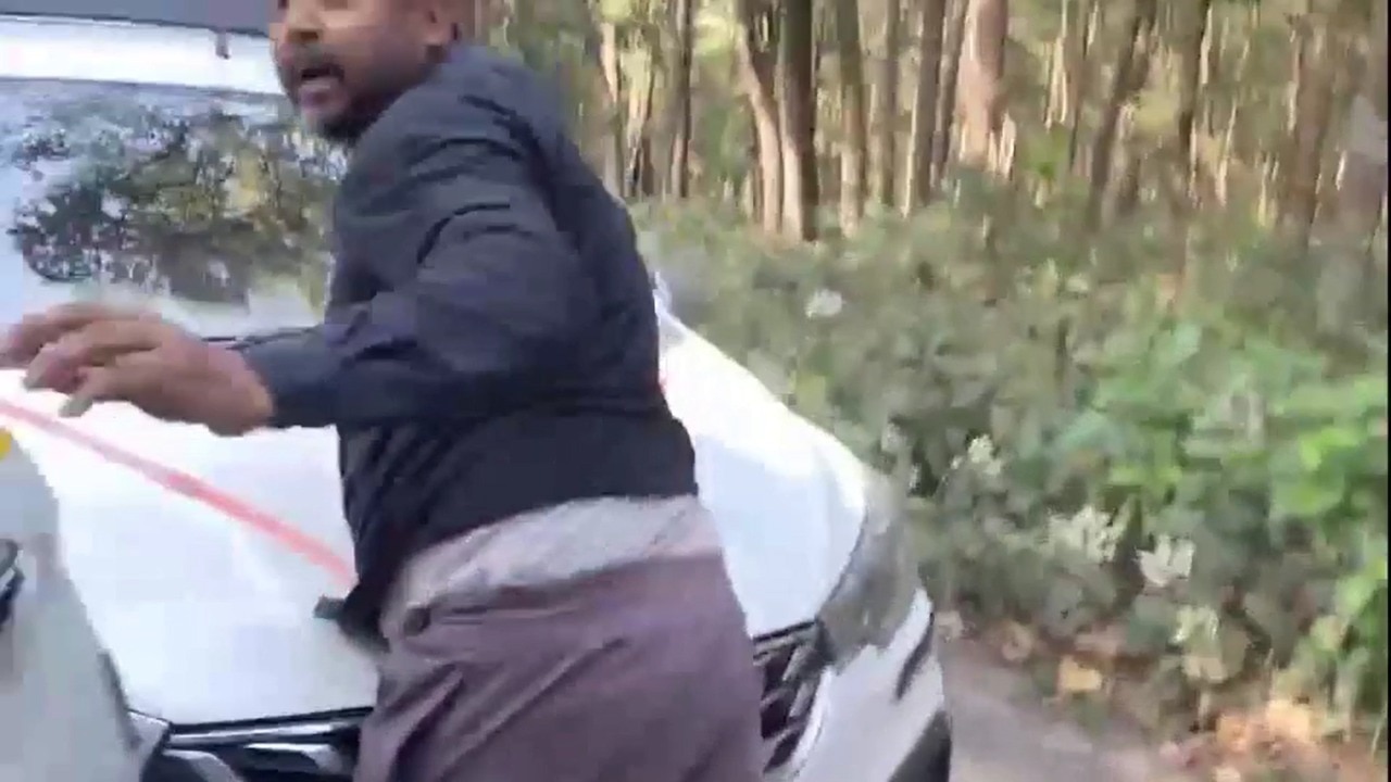 Man dragged on speeding car bonnet for 4 km after taxi drivers clash in UP