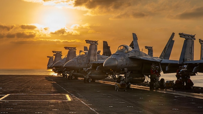 Aircraft on the flight deck of the USS Abraham Lincoln that are operating in support of the war in Iran US Iran war