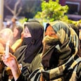 With tears in eyes, the women in black abayas and niqabs stood shoulder to shoulder mourning the killing of Ayatollah Khomeinei. With tears in eyes, the women in black abayas and niqabs stood shoulder to shoulder mourning the killing of Ayatollah Khomeinei.