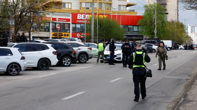 Police work at the site of a shooting incident in Ukraine's Kyiv on April 18. (Image: Reuters) Kyiv shooting