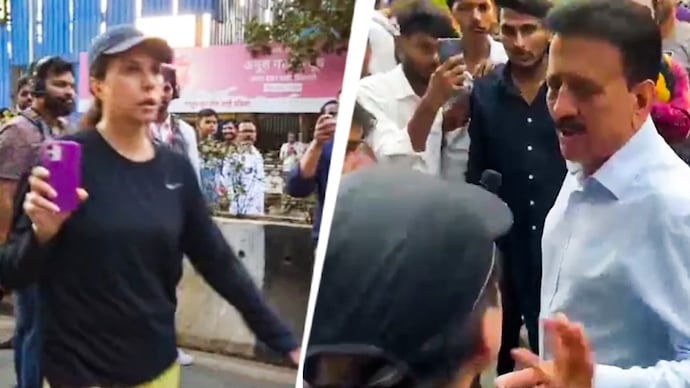 A commuter in Mumbai confronted Maharashtra minister Girish Mahajan over severe traffic disruption caused by a BJP protest rally in Worli. A commuter in Mumbai confronted Maharashtra minister Girish Mahajan over severe traffic disruption caused by a BJP protest rally in Worli.