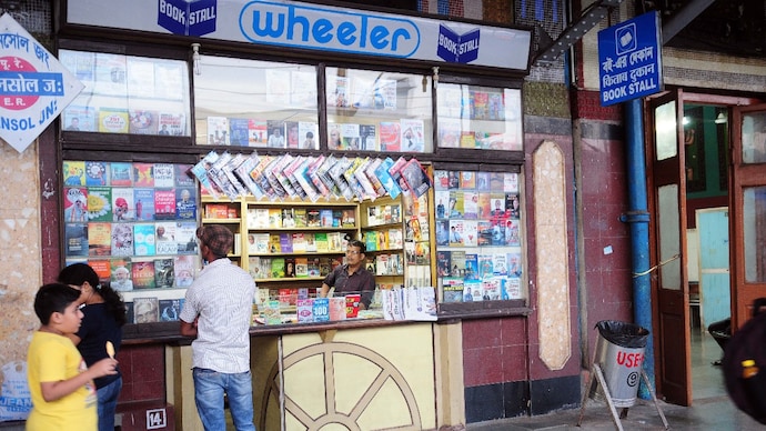 A wheeler book stall at railway station on June 4, 2016 in Asansol, India. (Photo by Indranil Bhoumik/Mint via Getty Images) A H Wheeler history, Indian railway book stalls history, Emile Moreau Wheeler, why Wheeler stalls closing, Indian Railway Library Kipling, railway platform bookstores India, Wheeler bookstalls Mumbai closure, history of Indian Railways retail