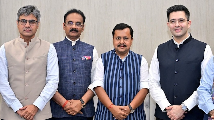 From left to right- Sandeep Pathak, Ashok Mittal and Raghav Chadha with BJP chief Nitin Nabin after quitting AAP on Friday. (Photo: X/@NitinNabin)